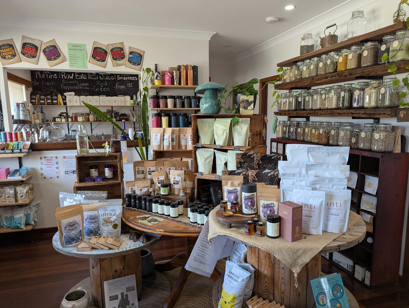 A wide view of the shop's timber product displays, counter and tea shelves